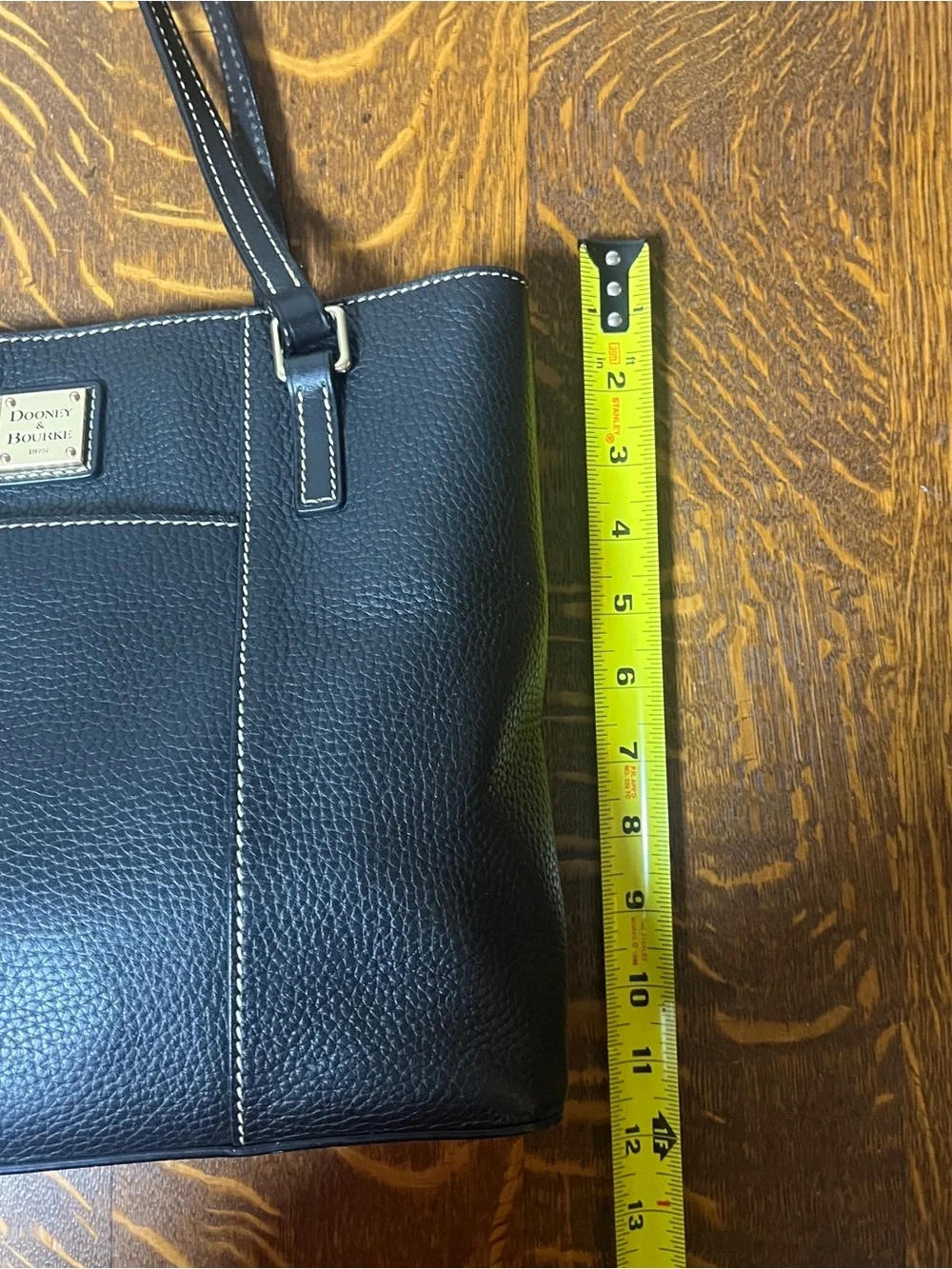 Dooney & Bourke Black Pebbled Leather Lexington Shoulder Tote with gold tone.